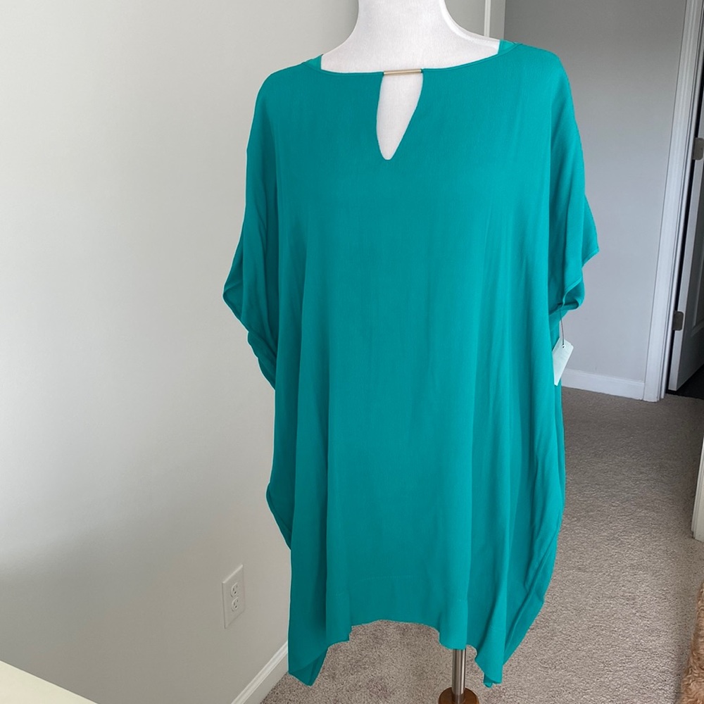 Women’s Teal Blouse. Still has tags.